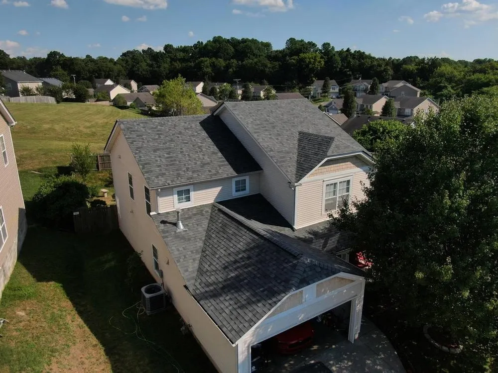 Slide of Dragon Scale Roofing & Solar