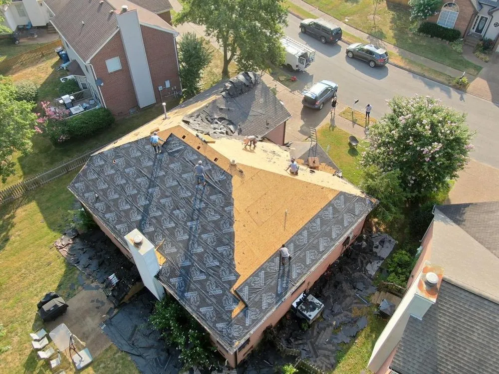 Slide of Dragon Scale Roofing & Solar