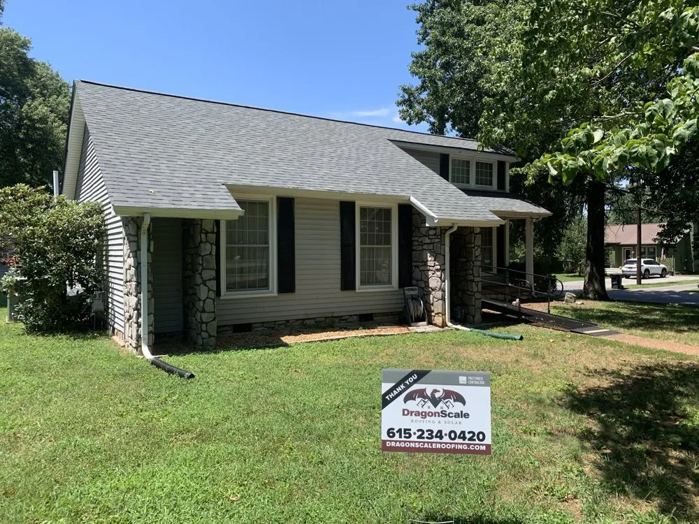 Slide of Dragon Scale Roofing & Solar