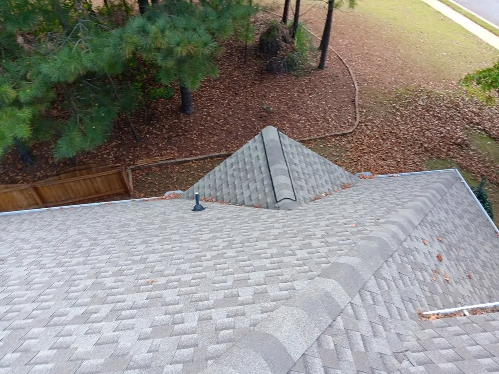 Slide of Drain rite gutter cleaning