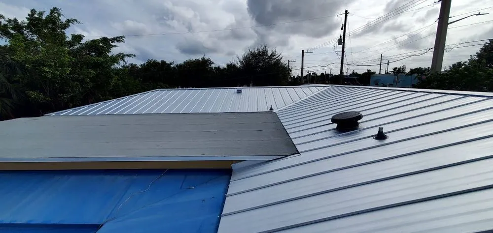 Slide of Dream Team Roofing