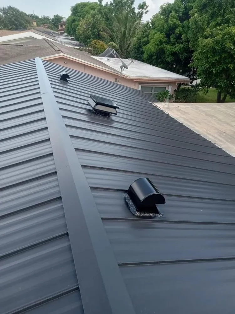 Slide of Dream Team Roofing