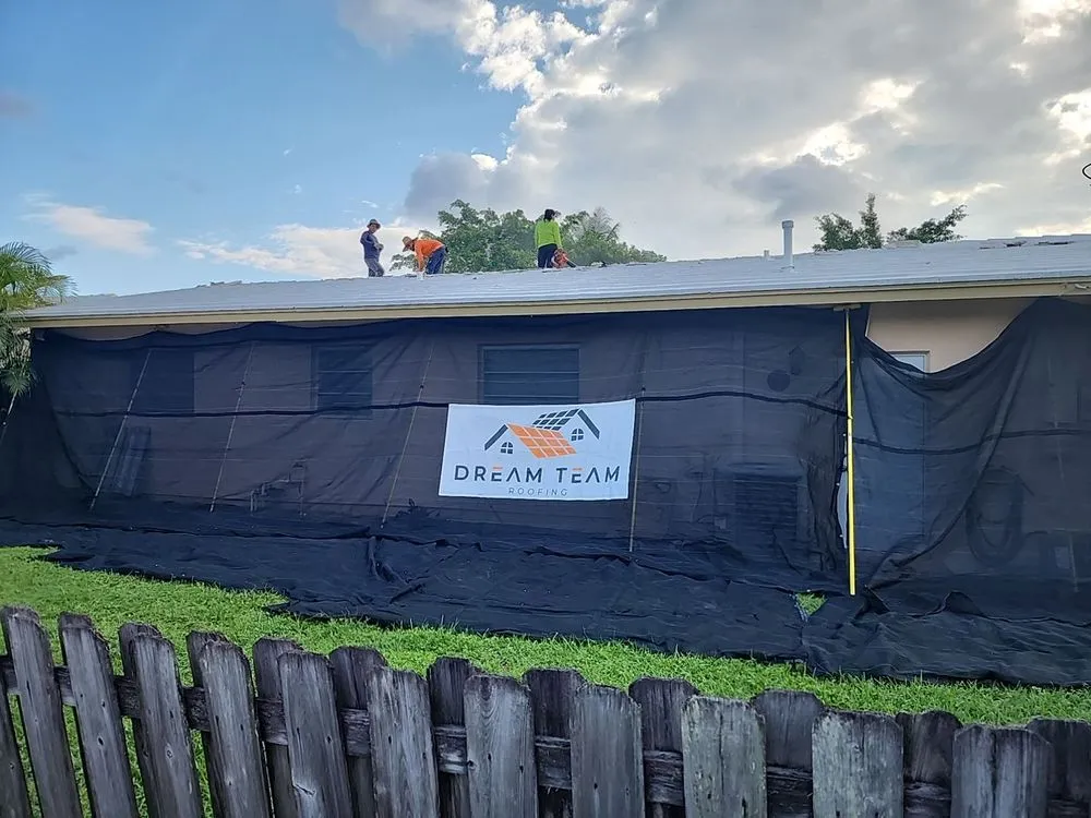 Slide of Dream Team Roofing