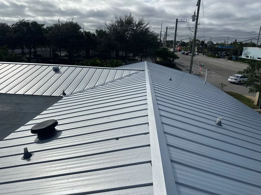 Slide of Dream Team Roofing