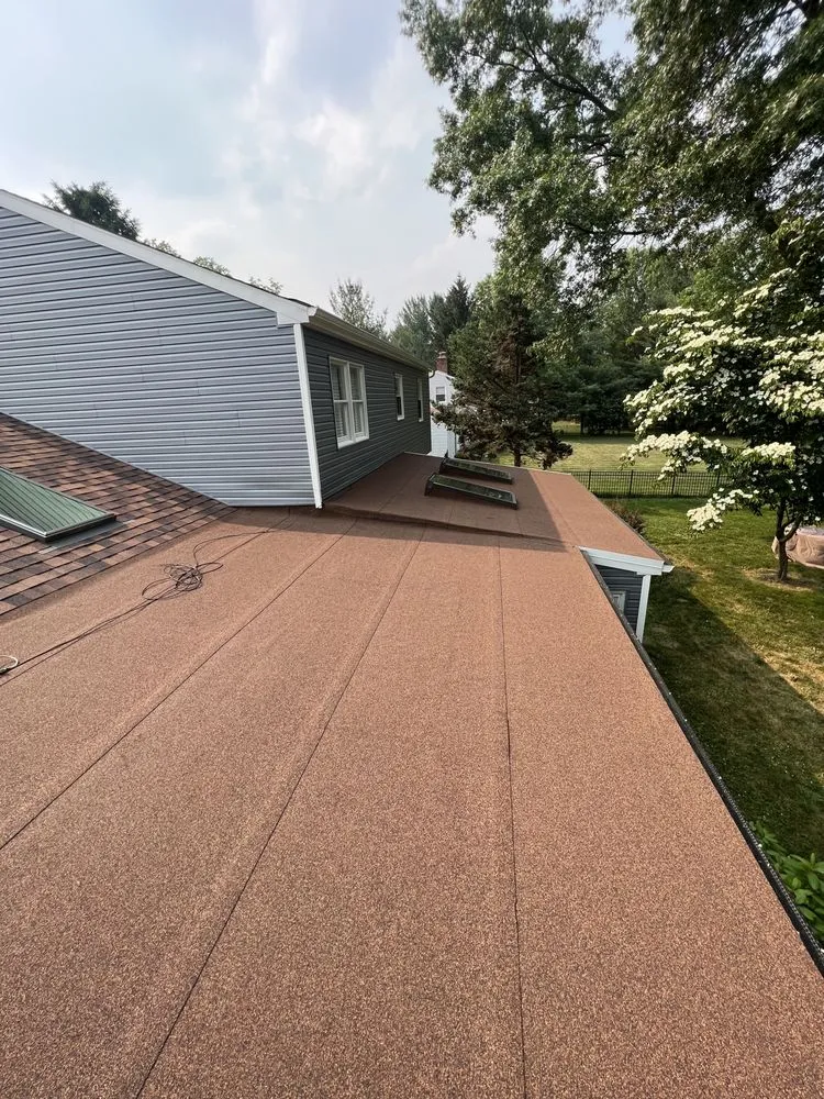 Slide of DreamLine Roofing