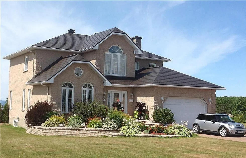 Slide of Drew's Affordable Steel Roofing