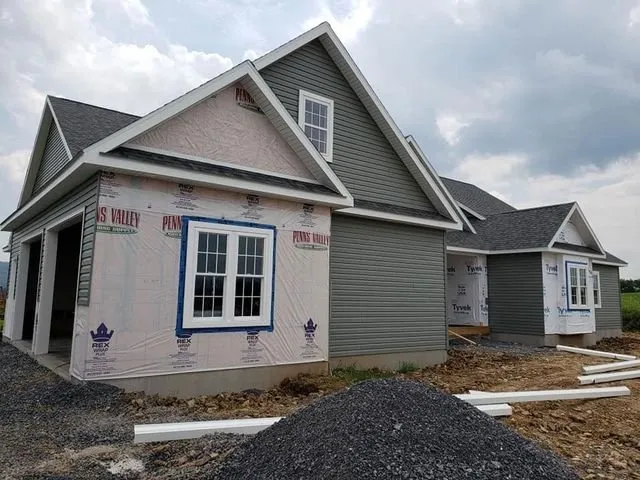 Licensed flat roof repair experts serving Richfield, PA - Drip Free Seamless Gutters