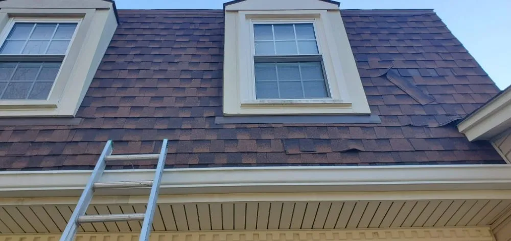 Slide of DRL Roofing Service