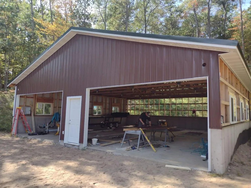 Professional storm damage roof repair in Lake Tomahawk, WI by DRM Builders