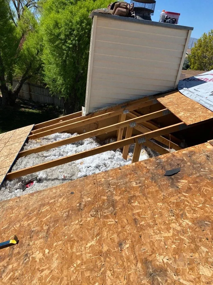 Slide of D's Roofing Experts