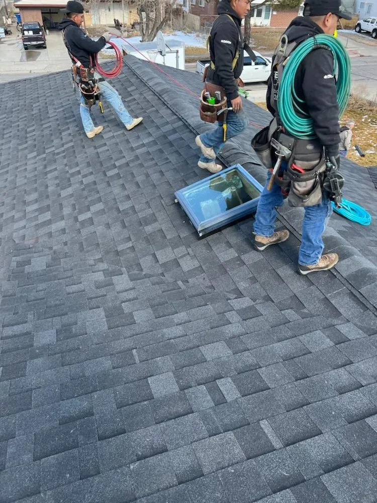 Slide of D's Roofing Experts