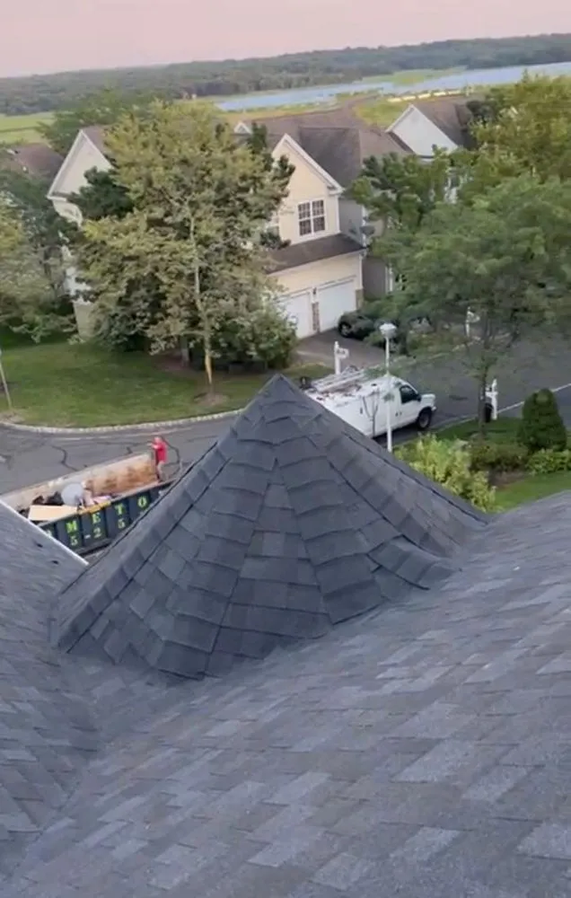 Slide of Duke's Roofing