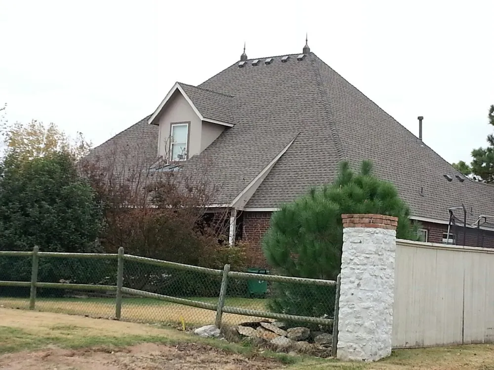 Slide of Dukes Roofing