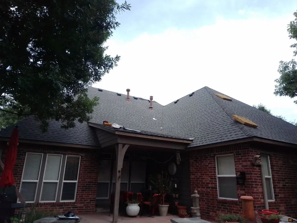 Slide of Dukes Roofing