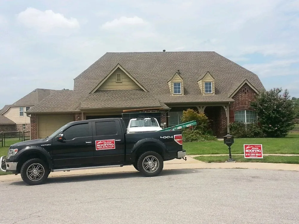 Slide of Dukes Roofing