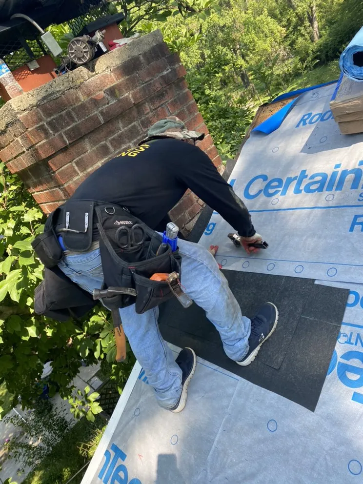 Slide of Dulles Roofing