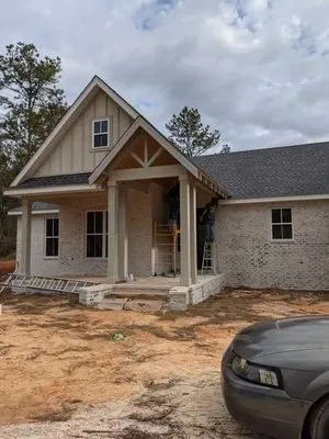 Duncan's Painting & Roofing Services Logo