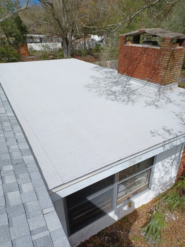 Slide of Dunedin Roofing