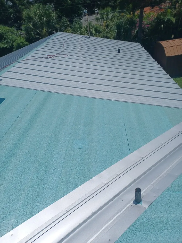 Slide of Dunedin Roofing