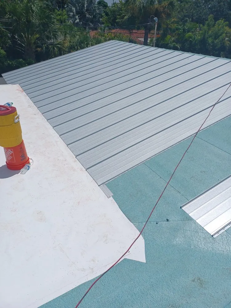 Slide of Dunedin Roofing