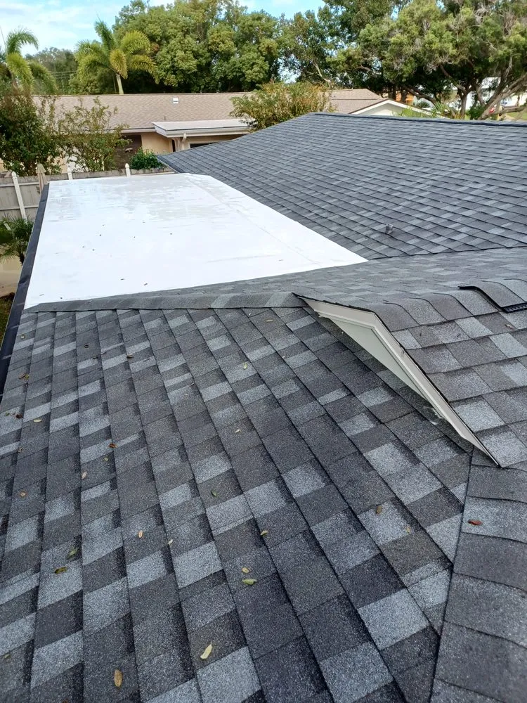 Slide of Dunedin Roofing