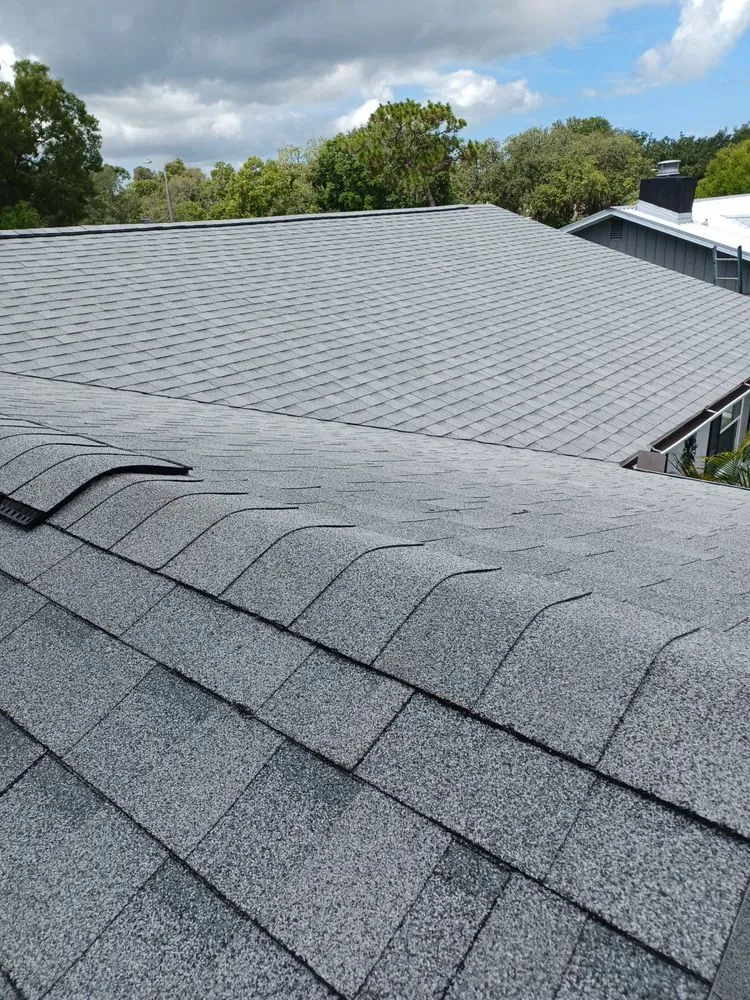 Slide of Dunedin Roofing