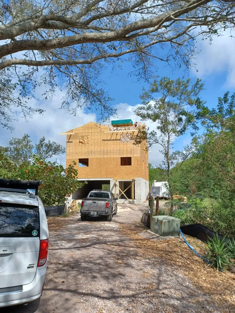 Slide of Dunedin Roofing