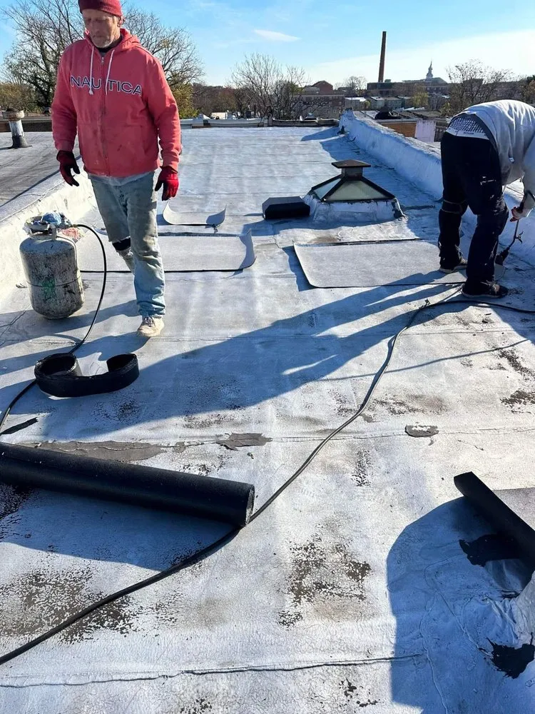 Slide of Dunlap and Sons Roofing