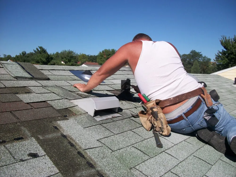 Slide of Dunlap and Sons Roofing