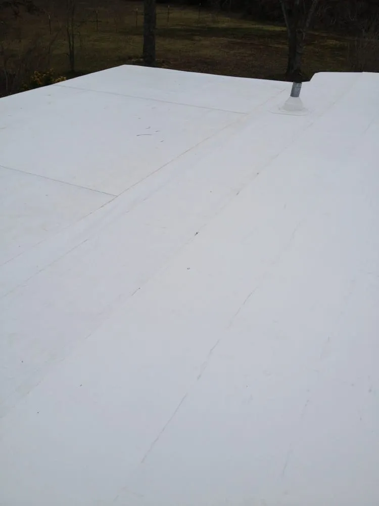 Slide of Dunn's Roofing