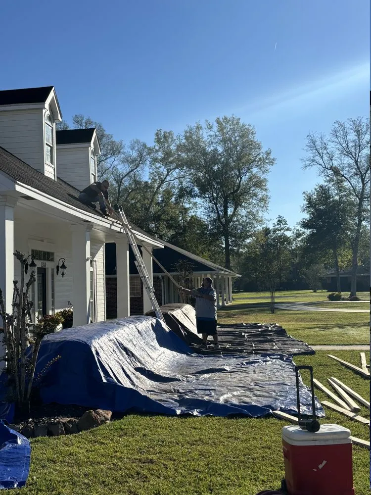 Slide of Dutchmark Roofing