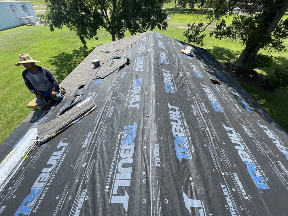 Slide of Dutchmark Roofing