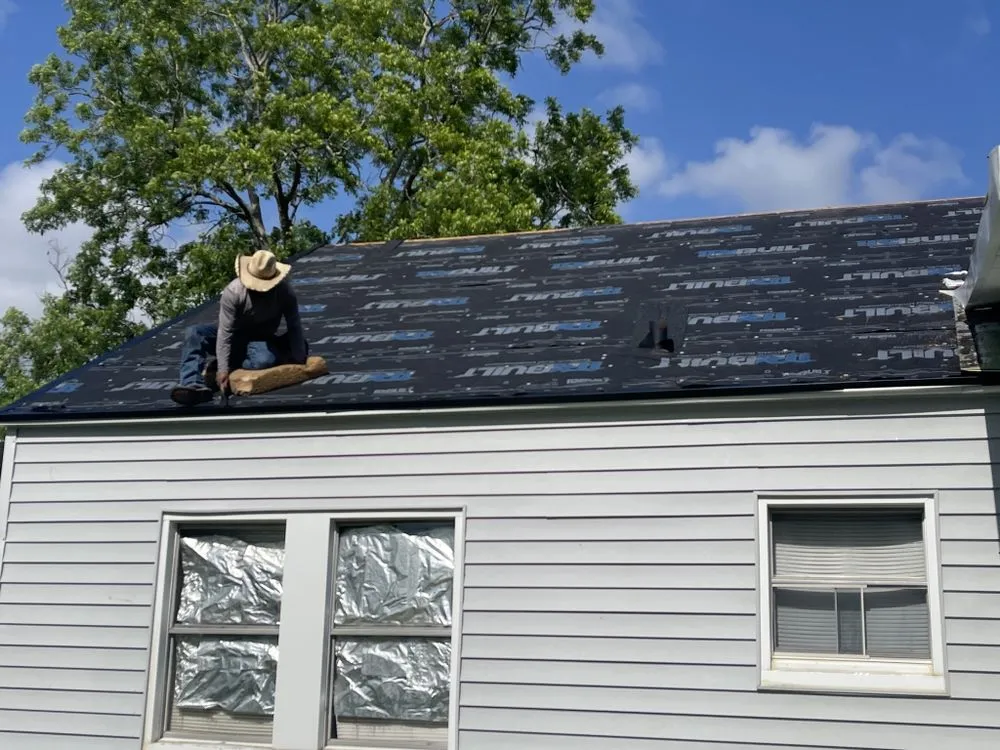 Slide of Dutchmark Roofing