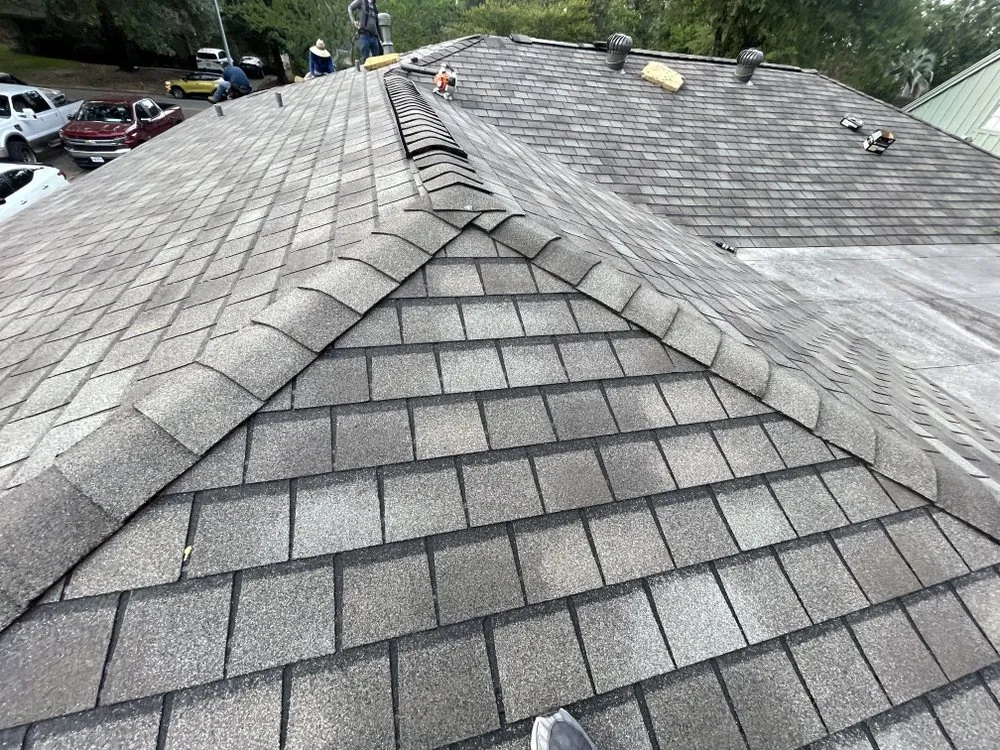 Slide of Dutchmark Roofing