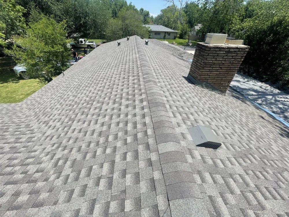 Slide of Dutchmark Roofing