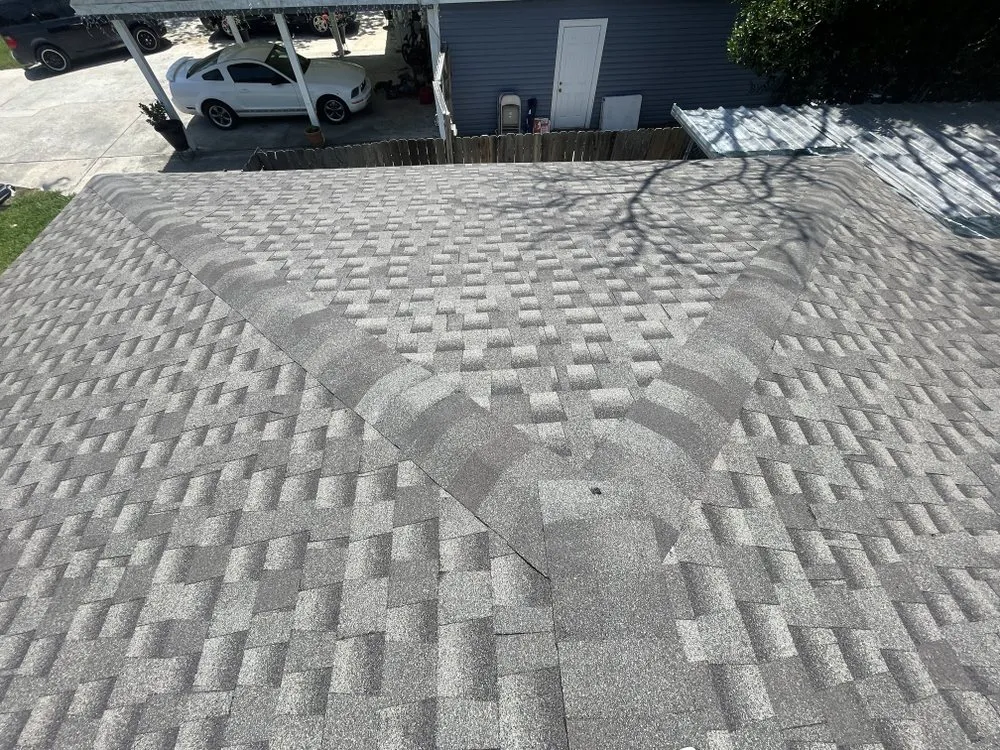 Slide of Dutchmark Roofing