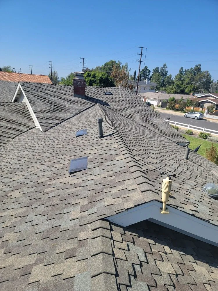 Slide of DV Roofing