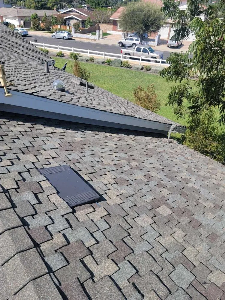 Slide of DV Roofing