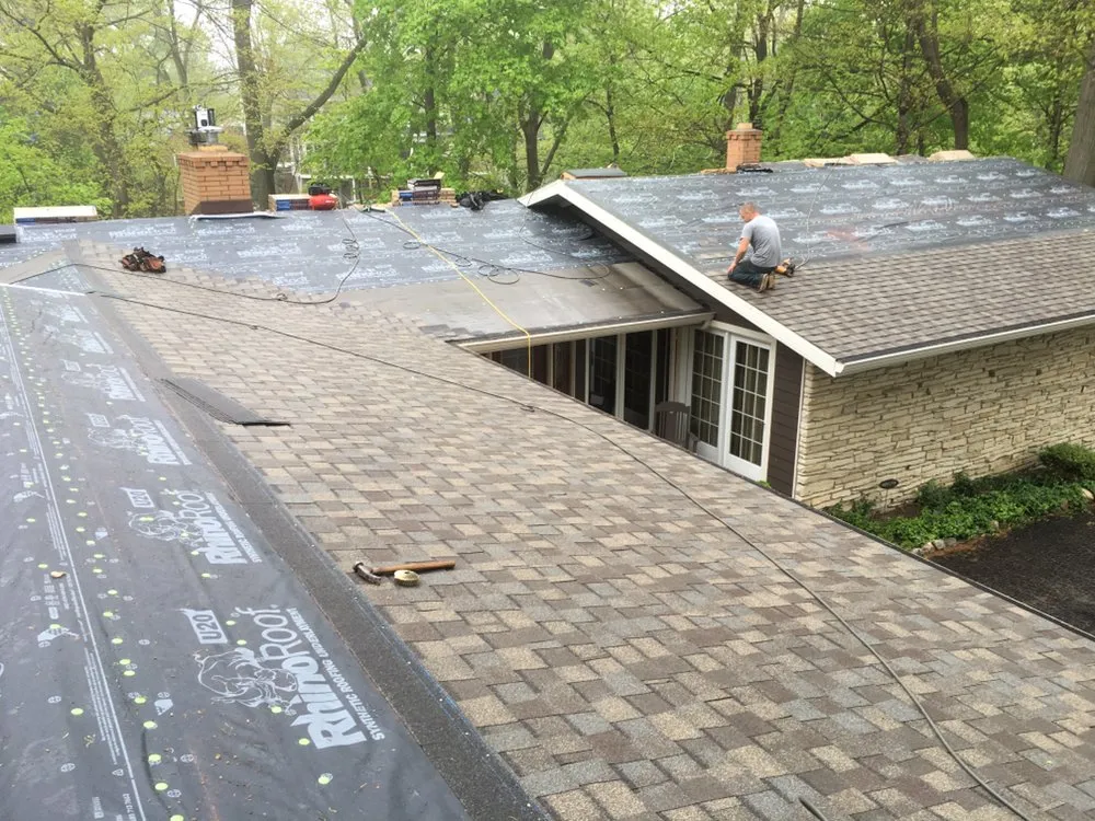 Slide of DWB Roofing