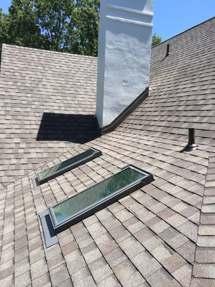 Slide of DWB Roofing