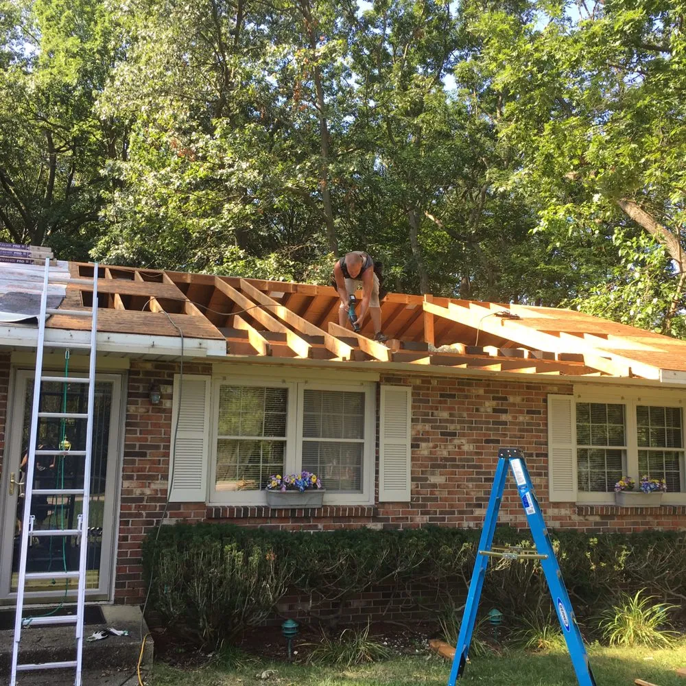 Slide of DWB Roofing