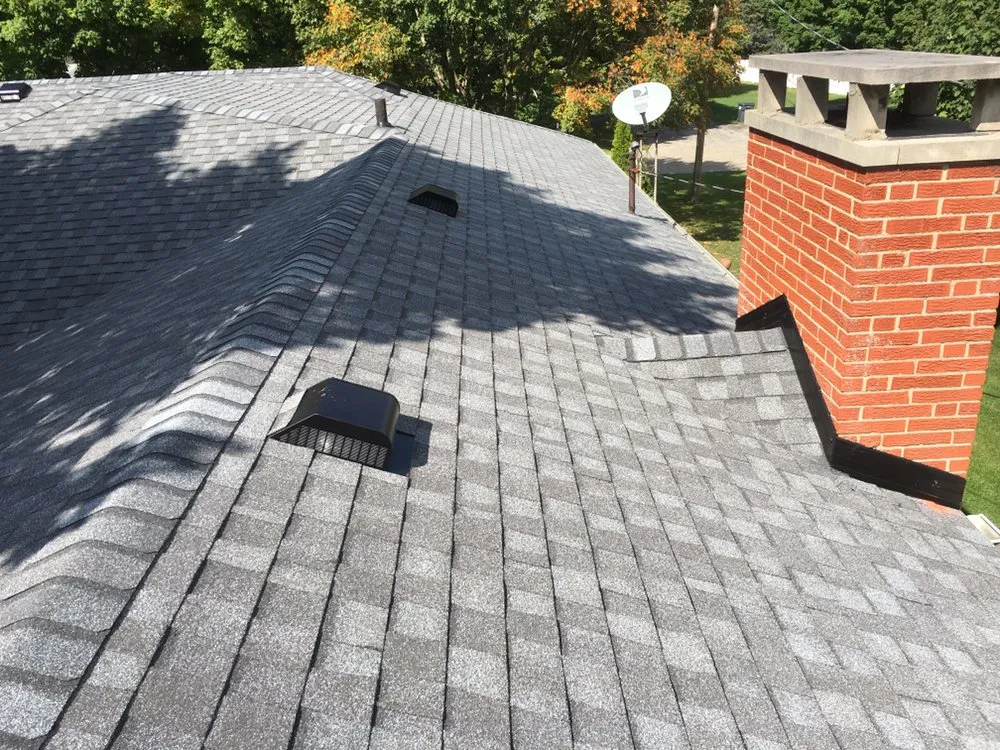 Slide of DWB Roofing