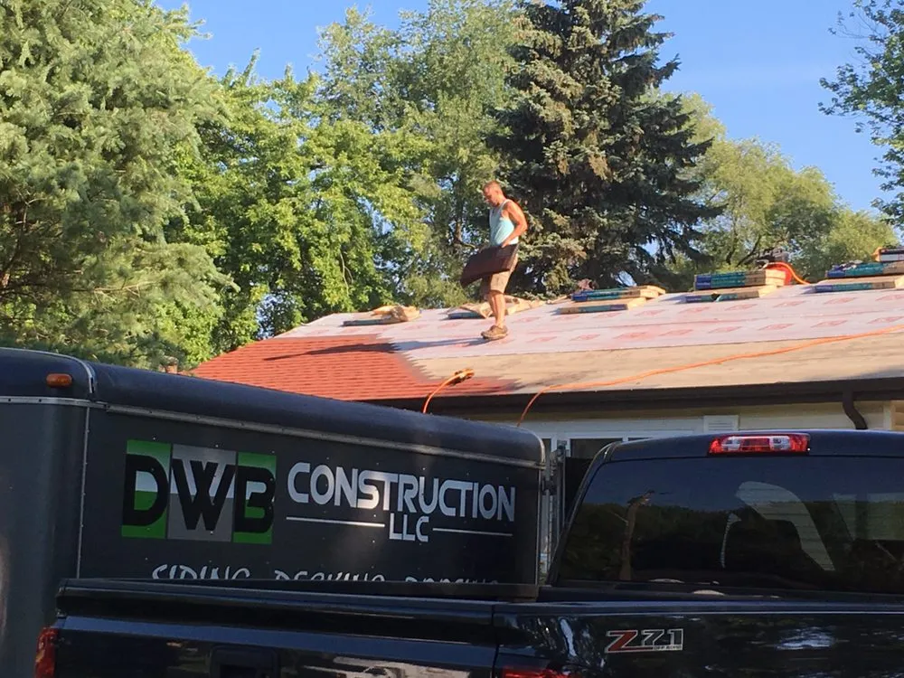 Slide of DWB Roofing