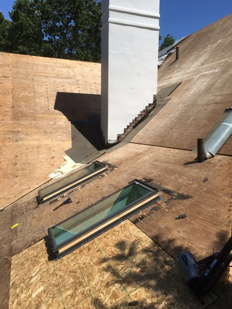 Slide of DWB Roofing