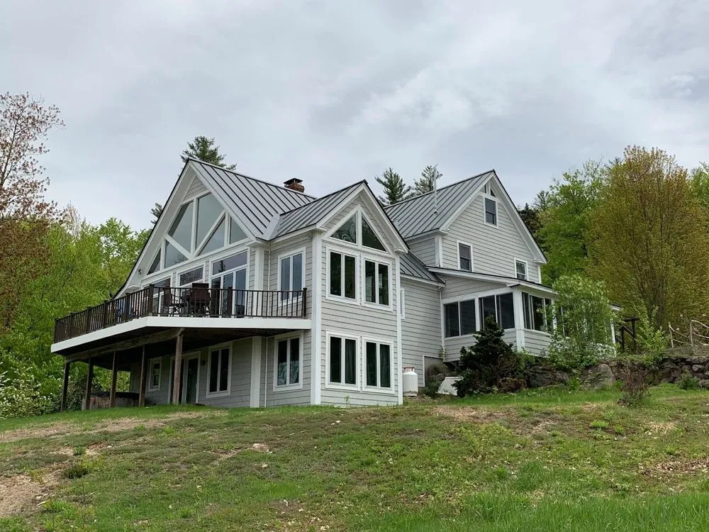 Local residential roofing service for homes in Center Conway, NH by Dwight and Sons Contracting