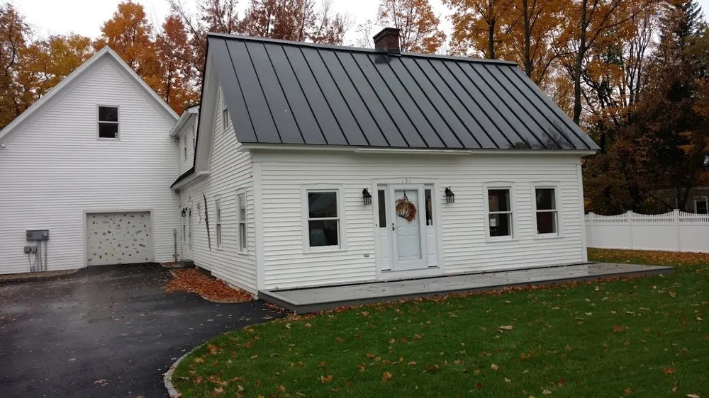Emergency metal roofing installation same-day service in Center Conway, NH by Dwight and Sons Contracting