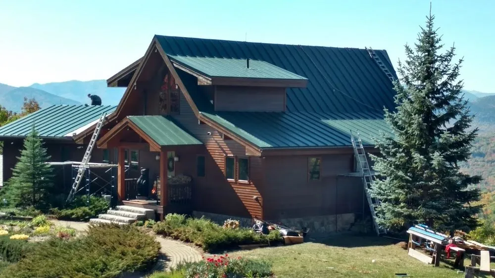 Top-rated flat roof repair in Center Conway, NH by Dwight and Sons Contracting