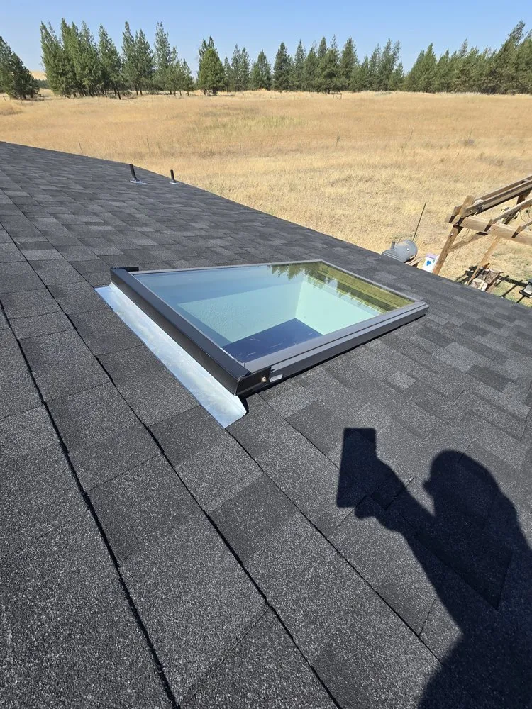 Licensed residential roofing service with free inspection in Coeur d'Alene, ID by Dykstra Roofing & Construction