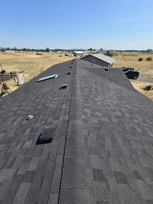 Dykstra Roofing & Construction Logo