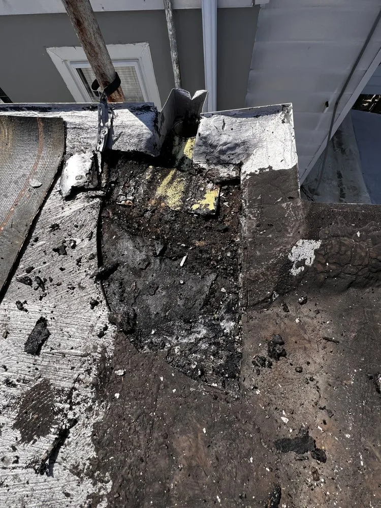 Slide of Dymond In The Ruff Roofing Repair